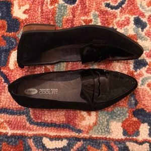 Black suede and patent leather Oxford shoes.